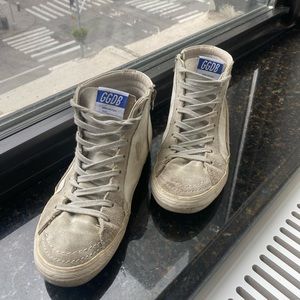 Selling these high top sneakers.